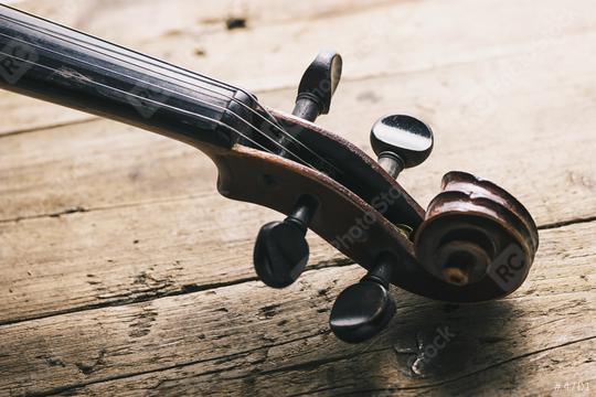 Antique Violin head on a wooden floor  : Stock Photo or Stock Video Download rcfotostock photos, images and assets rcfotostock | RC Photo Stock.: