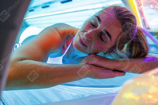 attractive  woman relaxing in solarium  : Stock Photo or Stock Video Download rcfotostock photos, images and assets rcfotostock | RC Photo Stock.: