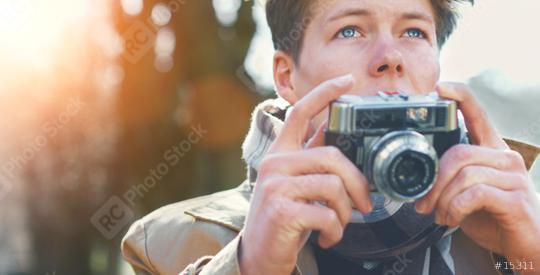 Attractive Tourist taking a photograph with vintage camera  : Stock Photo or Stock Video Download rcfotostock photos, images and assets rcfotostock | RC Photo Stock.:
