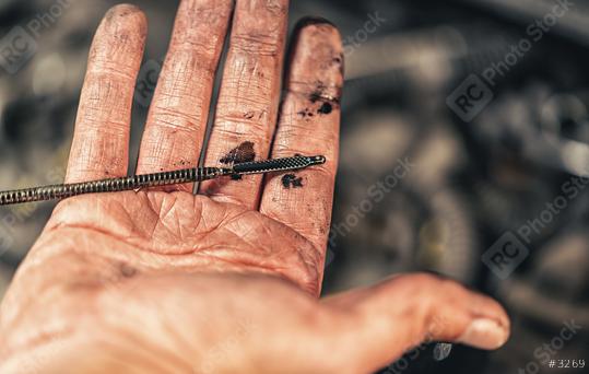Auto mechanic checking level motor oil in a car with open hand. Repair service. authentic close-up shot  : Stock Photo or Stock Video Download rcfotostock photos, images and assets rcfotostock | RC Photo Stock.: