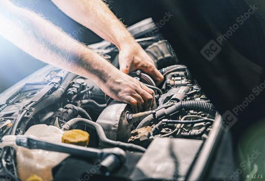 Auto mechanic repairing car  : Stock Photo or Stock Video Download rcfotostock photos, images and assets rcfotostock | RC Photo Stock.: