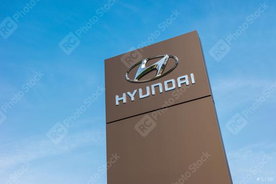 BAESWEILER, GERMANY MARCH, 2017: Logotype of Hyundai corporation on pillar against blue Sky.  Hyundai is the South Korea