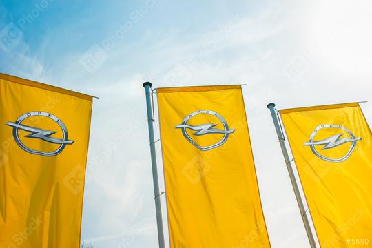 BAESWEILER, GERMANY MARCH, 2017: Opel flags against blue sky at the Opel Store. Opel AG is a German automobile manufacturer.  : Stock Photo or Stock Video Download rcfotostock photos, images and assets rcfotostock | RC Photo Stock.: