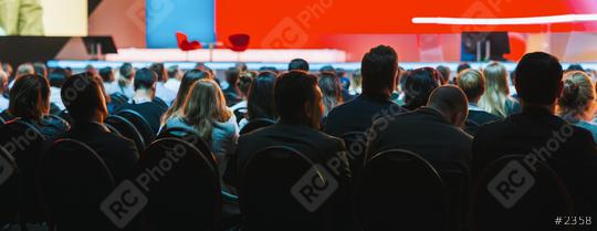 Banner cover page of Rear view of Audience listening Speakers on the stage in the conference hall or seminar meeting, business and education about investment concept  : Stock Photo or Stock Video Download rcfotostock photos, images and assets rcfotostock | RC Photo Stock.: