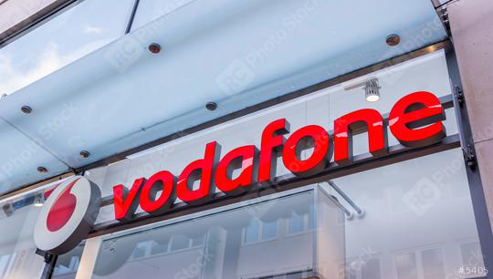 Barcelona, Spain - May 15, 2018: Vodafone sign on a building. Vodafone Group is a British telecommunications company headquartered in London and with its registered office in Newbury, Berkshire.  : Stock Photo or Stock Video Download rcfotostock photos, images and assets rcfotostock | RC Photo Stock.: