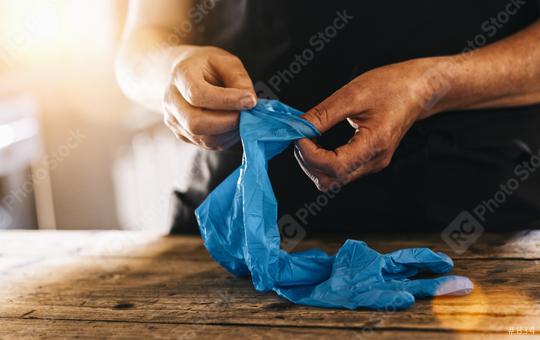 bartender or employee wearing a medical Latex gloves at work to prevent corona COVID-19 and SARS infection  : Stock Photo or Stock Video Download rcfotostock photos, images and assets rcfotostock | RC Photo Stock.: