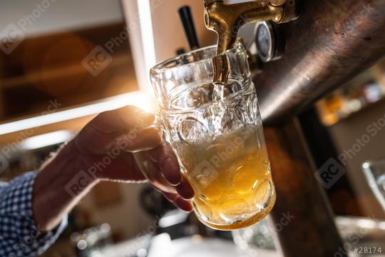 bartender pouring beer in mug at Biergarten or Oktoberfest, Munich, Germany  : Stock Photo or Stock Video Download rcfotostock photos, images and assets rcfotostock | RC Photo Stock.: