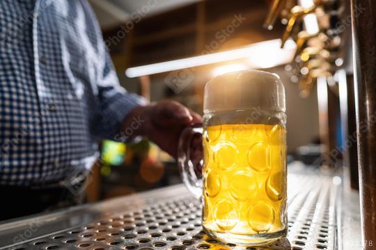 bartender serving beer in mug at Biergarten or Oktoberfest, Munich, Germany  : Stock Photo or Stock Video Download rcfotostock photos, images and assets rcfotostock | RC Photo Stock.: