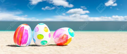 beach with colorful easter eggs during a easter vacation at the beach  : Stock Photo or Stock Video Download rcfotostock photos, images and assets rcfotostock | RC Photo Stock.: