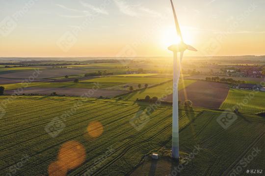 Beautiful sunset above the windmills on the field  : Stock Photo or Stock Video Download rcfotostock photos, images and assets rcfotostock | RC Photo Stock.: