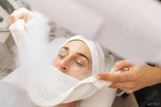 Beauty treatment of face with ozone facial steamer in beauty center or cosmetology salon.   : Stock Photo or Stock Video Download rcfotostock photos, images and assets rcfotostock | RC Photo Stock.: