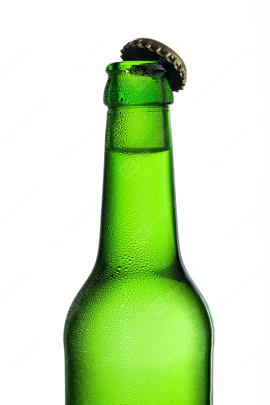 Beer bottle with kron cork and drops of condensation dew party drink alcohol  : Stock Photo or Stock Video Download rcfotostock photos, images and assets rcfotostock | RC Photo Stock.: