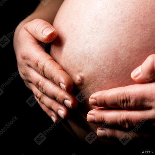 belly of pregnant woman with hands close-up  : Stock Photo or Stock Video Download rcfotostock photos, images and assets rcfotostock | RC Photo Stock.:
