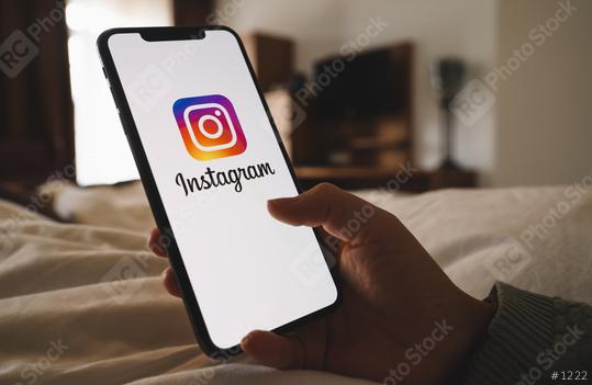 BERLIN, GERMANY AUGUST 2019: Woman hand holding iphone Xs with logo of instagram application. Instagram is largest and most popular photograph social networking.  : Stock Photo or Stock Video Download rcfotostock photos, images and assets rcfotostock | RC Photo Stock.:
