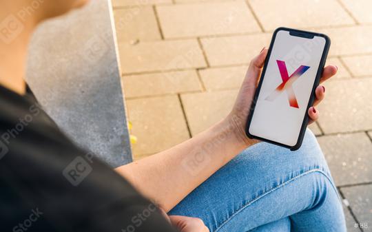 BERLIN, GERMANY AUGUST 2019: Woman hand holding iphone Xs with logo of the New Apple iPhone X smartphone.   : Stock Photo or Stock Video Download rcfotostock photos, images and assets rcfotostock | RC Photo Stock.: