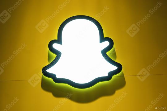 BERLIN, GERMANY JULY 2019: Snapchat logo with rainbow printed on a paper wall. Snapchat is a popular social media application for sharing messages, images and videos.  : Stock Photo or Stock Video Download rcfotostock photos, images and assets rcfotostock | RC Photo Stock.: