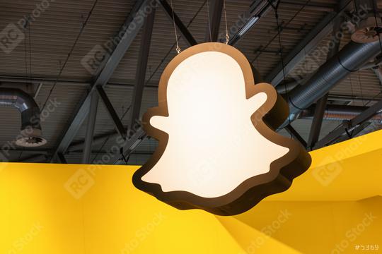 BERLIN, GERMANY JULY 2019: Snapchat logo with rainbow printed on a paper wall. Snapchat is a popular social media application for sharing messages, images and videos.  : Stock Photo or Stock Video Download rcfotostock photos, images and assets rcfotostock | RC Photo Stock.: