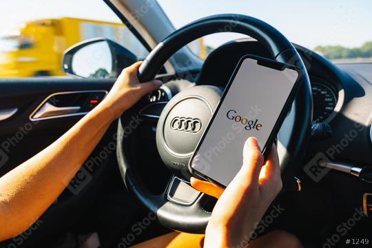 BERLIN, GERMANY JULY 2019: Woman hand holding iphone Xs with logo of google in a car. Google is an American technology and online services company  : Stock Photo or Stock Video Download rcfotostock photos, images and assets rcfotostock | RC Photo Stock.: