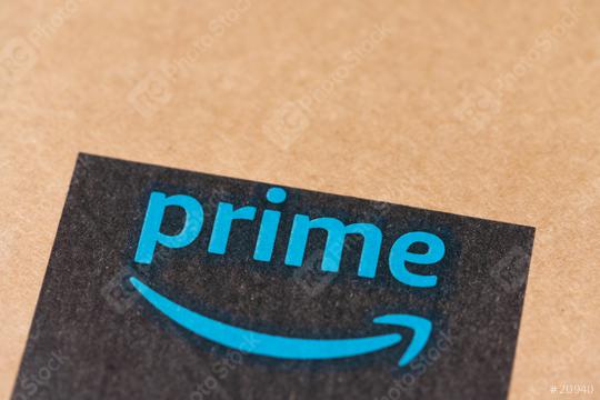 BERLIN, GERMANY JUNE 2020: Amazon Prime logotype printed on cardboard box security scotch tape. Prime is a service offered by online retailer Amazon for faster delivery of orders.  : Stock Photo or Stock Video Download rcfotostock photos, images and assets rcfotostock | RC Photo Stock.: