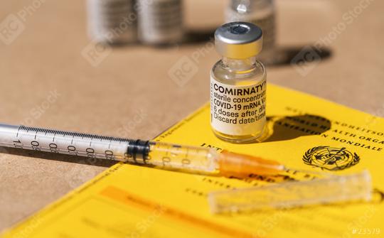 BERLIN, GERMANY JUNE 2021: Certificate of the first vaccination with Pfizer–BioNTech COVID-19 vaccine comirnaty, syringe and a international who vaccination certificate.    : Stock Photo or Stock Video Download rcfotostock photos, images and assets rcfotostock | RC Photo Stock.: