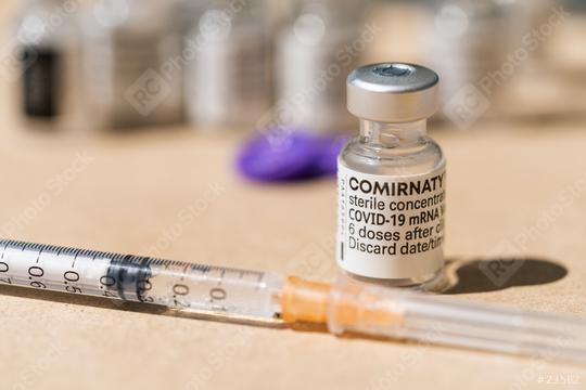 BERLIN, GERMANY JUNE 2021: COVID-19 mrna biontech pfizer SARS virus vaccine ampoules. COMIRNATY mRNA vaccine on white backround. Syringe with COMIRNATY vaccine against SARS COVID-19 virus.  : Stock Photo or Stock Video Download rcfotostock photos, images and assets rcfotostock | RC Photo Stock.: