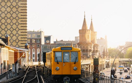 Berliner U-Bahn with Oberbaum Bridge in the background in golden evening light at sunset, , Capital of Germany  : Stock Photo or Stock Video Download rcfotostock photos, images and assets rcfotostock | RC Photo Stock.: