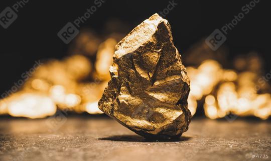 big gold nugget in front of a mound of gold -  finance concept  : Stock Photo or Stock Video Download rcfotostock photos, images and assets rcfotostock | RC Photo Stock.: