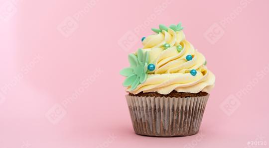Birthday cupcake with colorful marzipan flower decoration on pink background  : Stock Photo or Stock Video Download rcfotostock photos, images and assets rcfotostock | RC Photo Stock.: