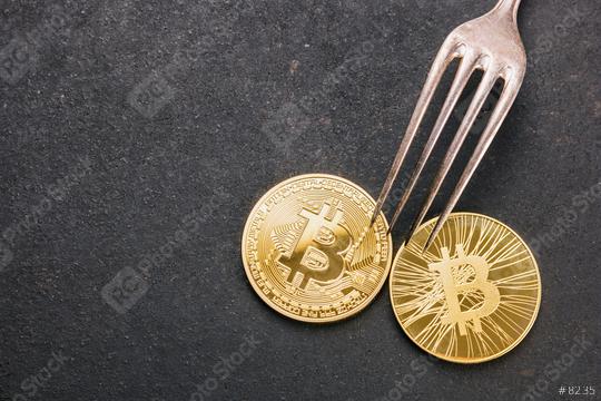 bitcoin (BTC) and Bitcoin Cash (BCH) Hard Fork, golden cryptocurrency concept image  : Stock Photo or Stock Video Download rcfotostock photos, images and assets rcfotostock | RC Photo Stock.: