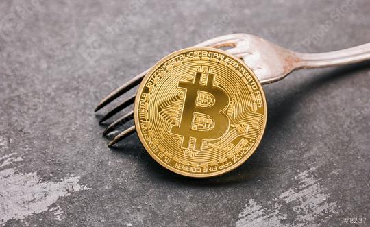 Bitcoin (BTC) on a Fork, digital cryptocurrency concept image  : Stock Photo or Stock Video Download rcfotostock photos, images and assets rcfotostock | RC Photo Stock.: