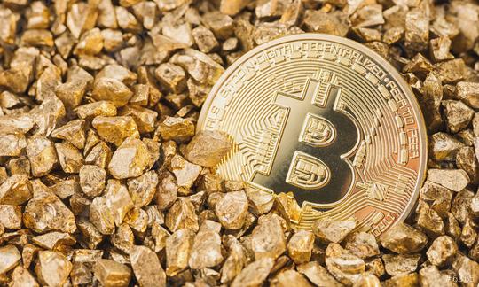 Bitcoin Coin in a mound of gold - cryptocurrency coin  : Stock Photo or Stock Video Download rcfotostock photos, images and assets rcfotostock | RC Photo Stock.: