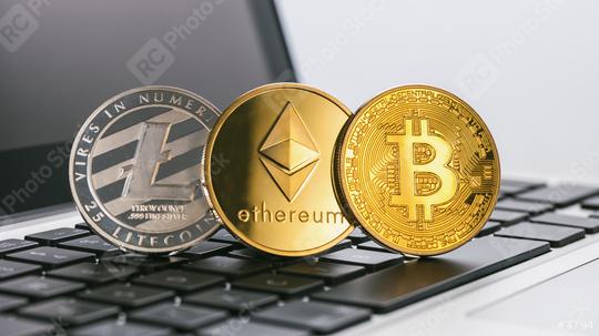 Bitcoin, Ethereum, Litecoin Digital cryptocurrencys on a notebook  : Stock Photo or Stock Video Download rcfotostock photos, images and assets rcfotostock | RC Photo Stock.: