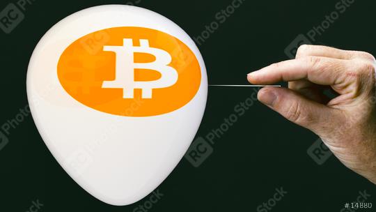 bitcoins - bit coin BTC the new virtual money on balloon with needle in hand before burst  : Stock Photo or Stock Video Download rcfotostock photos, images and assets rcfotostock | RC Photo Stock.: