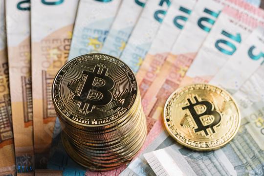 bitcoins stack Cryptocurrency on top of Euro banknotes  : Stock Photo or Stock Video Download rcfotostock photos, images and assets rcfotostock | RC Photo Stock.: