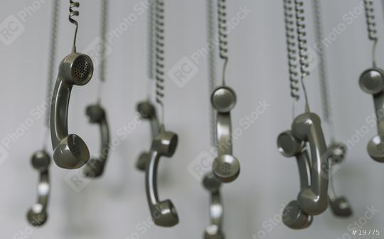 black telephone receivers hanging over gray background concept hold or contact us   : Stock Photo or Stock Video Download rcfotostock photos, images and assets rcfotostock | RC Photo Stock.:
