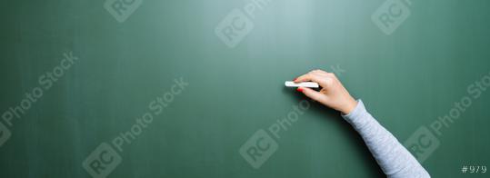 Blank blackboard / chalkboard, hand writing on green chalk board holding chalk, with copyspace for your individual text.  : Stock Photo or Stock Video Download rcfotostock photos, images and assets rcfotostock | RC Photo Stock.: