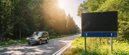 Blank Road Sign at the forest street with car, copyspace for your individual text.  : Stock Photo or Stock Video Download rcfotostock photos, images and assets rcfotostock | RC Photo Stock.: