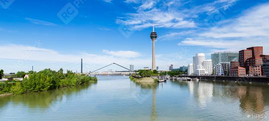 Blue Sky with clouds at summer in Dusseldorf. Rheinturm tower and a bridge, Nordrhein-Westfalen, Germany, Europe.  : Stock Photo or Stock Video Download rcfotostock photos, images and assets rcfotostock | RC Photo Stock.: