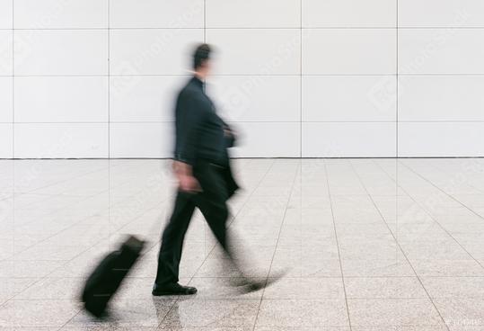 blurred anonymous businessman at a airport  : Stock Photo or Stock Video Download rcfotostock photos, images and assets rcfotostock | RC Photo Stock.:
