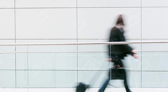 blurred anonymous commuter walking in a floor  : Stock Photo or Stock Video Download rcfotostock photos, images and assets rcfotostock | RC Photo Stock.: