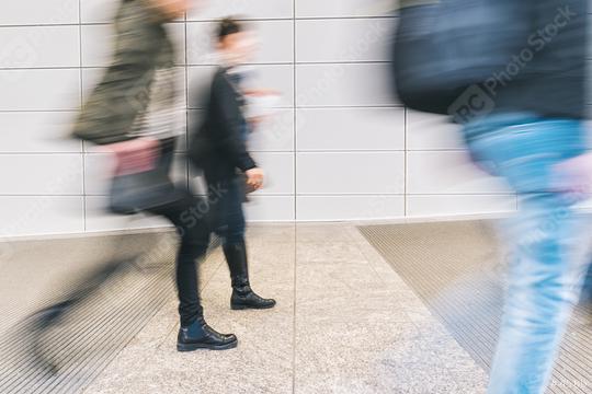 blurred anonymous pedestrian walking in a corridor  : Stock Photo or Stock Video Download rcfotostock photos, images and assets rcfotostock | RC Photo Stock.: