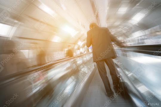 blurred business passenger on a escalator  : Stock Photo or Stock Video Download rcfotostock photos, images and assets rcfotostock | RC Photo Stock.:
