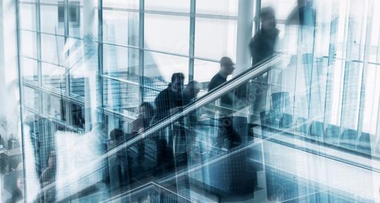 Blurred business people at a escalator  : Stock Photo or Stock Video Download rcfotostock photos, images and assets rcfotostock | RC Photo Stock.: