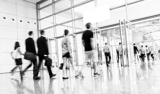 Blurred business people at a European trade fair entrance  : Stock Photo or Stock Video Download rcfotostock photos, images and assets rcfotostock | RC Photo Stock.: