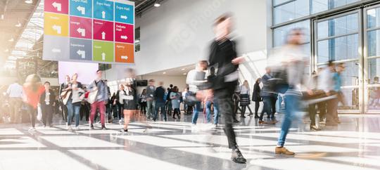 blurred business people at a trade fair   : Stock Photo or Stock Video Download rcfotostock photos, images and assets rcfotostock | RC Photo Stock.: