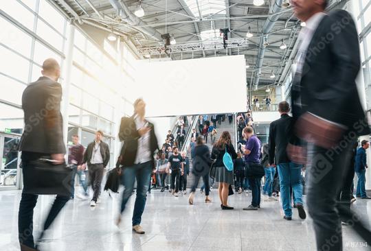 blurred business people at rush hour at a trade fair  : Stock Photo or Stock Video Download rcfotostock photos, images and assets rcfotostock | RC-Photo-Stock.: