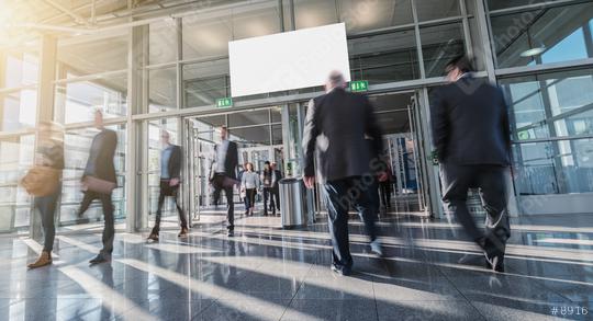 Blurred business people in a modern hall  : Stock Photo or Stock Video Download rcfotostock photos, images and assets rcfotostock | RC Photo Stock.: