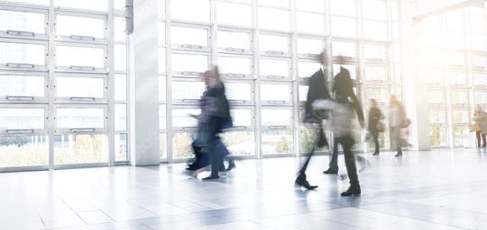 Blurred business people using a walkway at a Exhibition  : Stock Photo or Stock Video Download rcfotostock photos, images and assets rcfotostock | RC Photo Stock.: