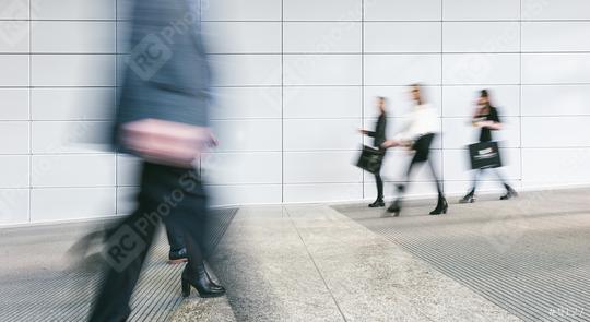 Blurred business people walking  : Stock Photo or Stock Video Download rcfotostock photos, images and assets rcfotostock | RC Photo Stock.: