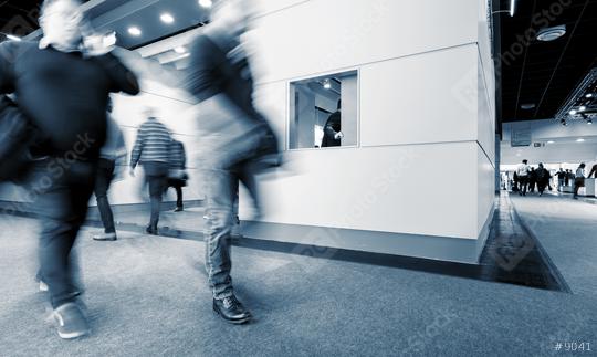 Blurred business people Walking at Rush Hour on a Exhibition  : Stock Photo or Stock Video Download rcfotostock photos, images and assets rcfotostock | RC Photo Stock.: